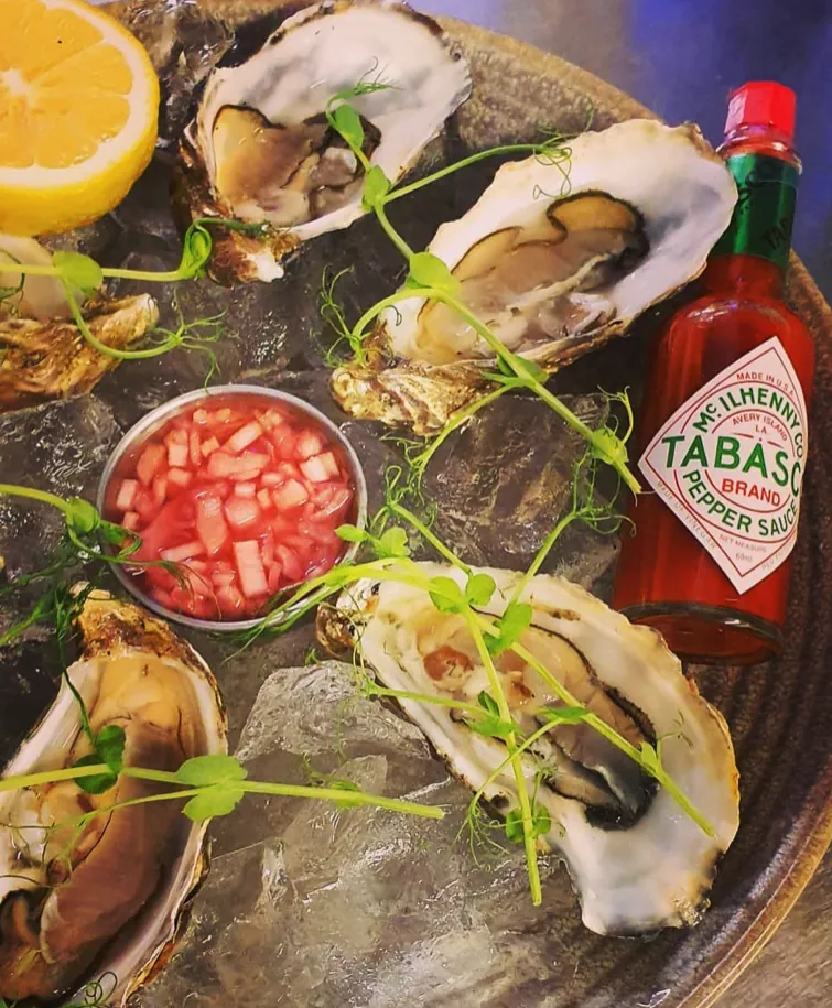 Fresh oysters on ice with lemon and Tabasco at The Harbour Inn